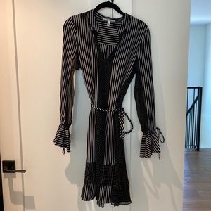 Never worn featherlight dress !